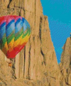Colorful Air Balloon In Mountain Clif Duirng Daytime diamond paintings