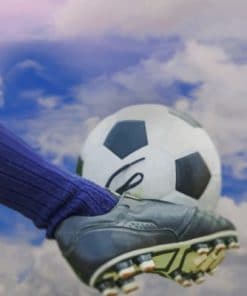 Soccer Player Shooting A Ball